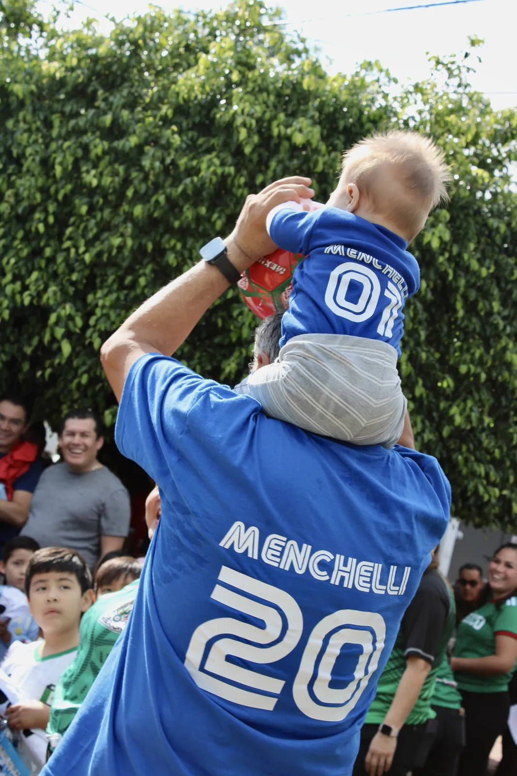 Dad with his baby on his shoulders